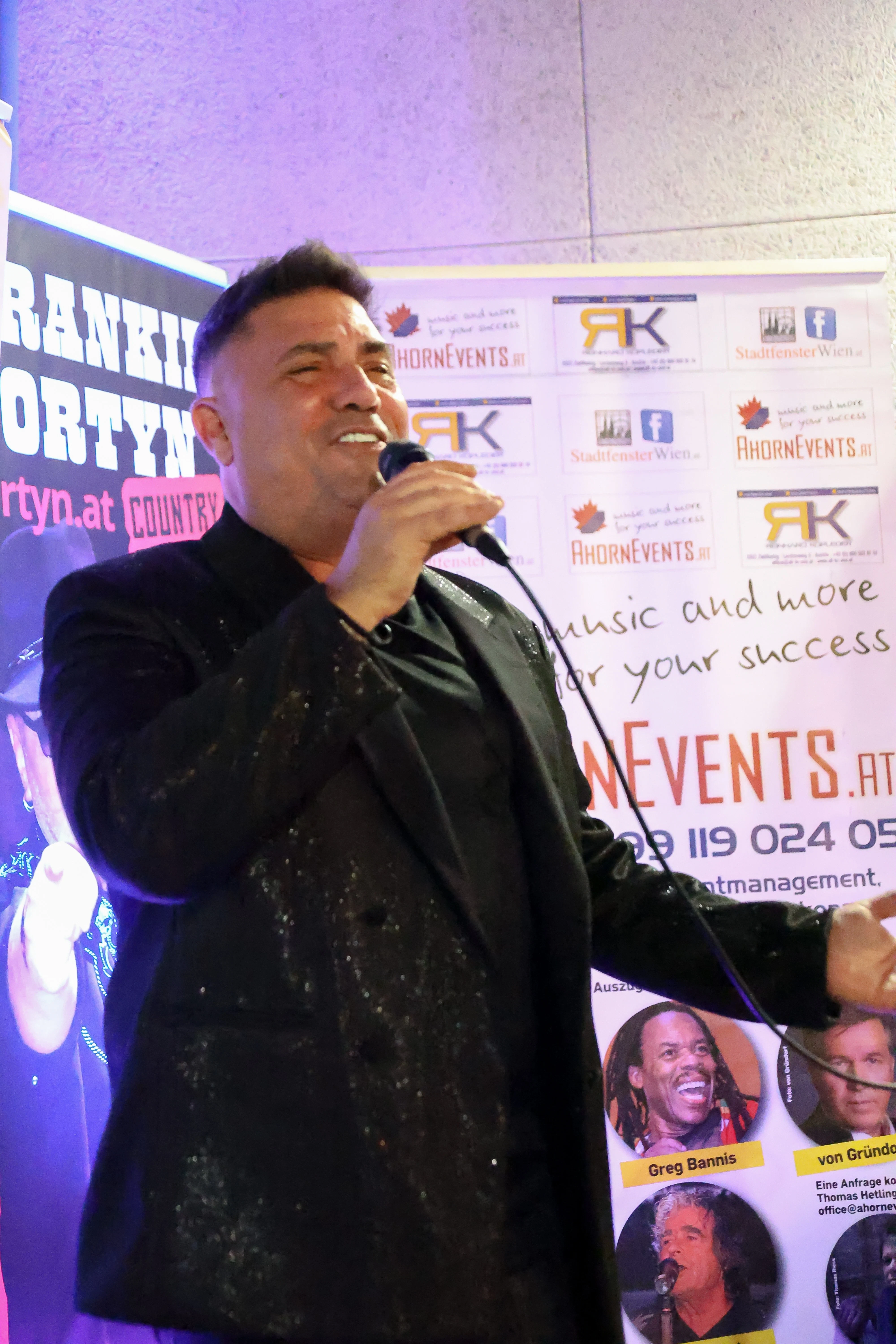 Carlos López performing on stage
